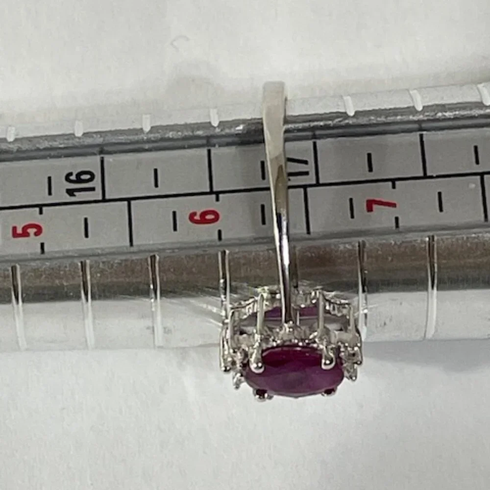Sterling silver and red gemstone ring. Appx. size 6 1/4.